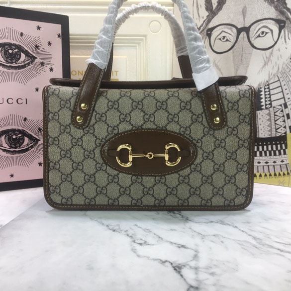 G*u*i top handle bags